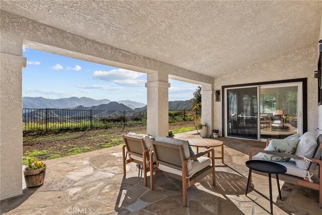 25174 Mulholland Hwy, Calabasas, CA 91302 - view of patio / terrace featuring a mountain view and outdoor dining space