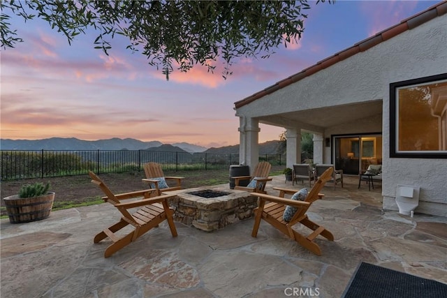 25174 Mulholland Hwy, Calabasas, CA 91302 - view of patio with a fire pit and a mountain view