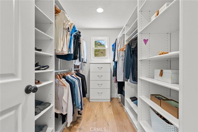 25174 Mulholland Hwy, Calabasas, CA 91302 - walk in closet with wood finished floors