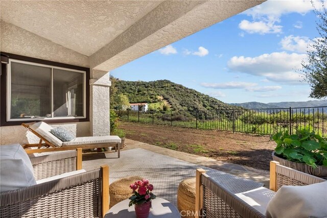 25174 Mulholland Hwy, Calabasas, CA 91302 - fenced backyard with a mountain view and a patio