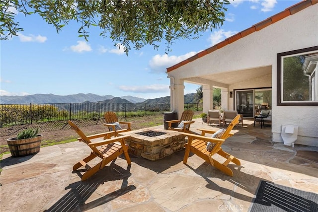 25174 Mulholland Hwy, Calabasas, CA 91302 - view of patio / terrace featuring a fire pit and a mountain view