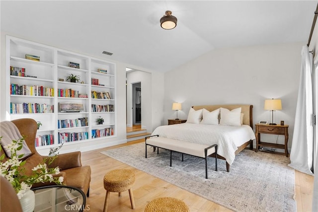 25174 Mulholland Hwy, Calabasas, CA 91302 - bedroom with wood finished floors and vaulted ceiling