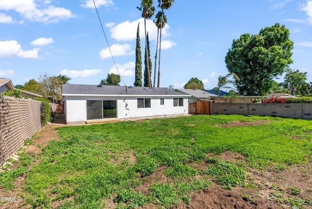 8751 Odessa Ave, North Hills, CA 91343 - rear view of property featuring a fenced backyard
