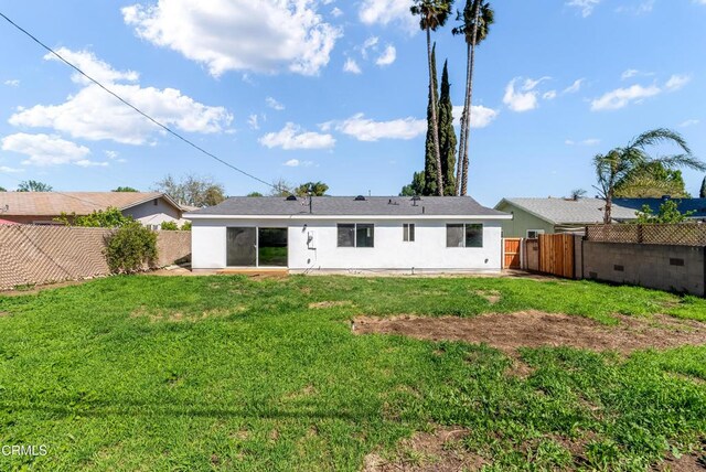 8751 Odessa Ave, North Hills, CA 91343 - rear view of property featuring a fenced backyard