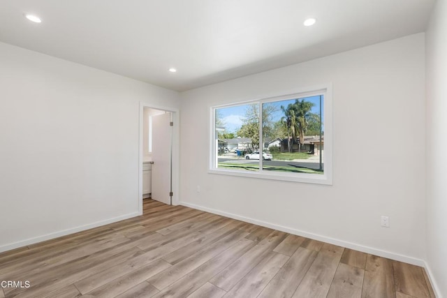 8751 Odessa Ave, North Hills, CA 91343 - spare room featuring light wood-type flooring and recessed lighting