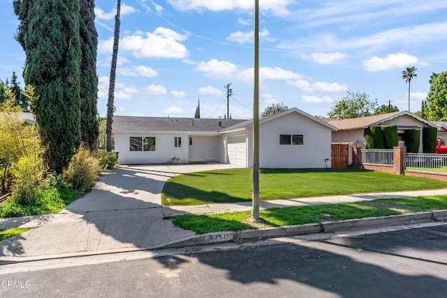 8751 Odessa Ave, North Hills, CA 91343 - ranch-style house with a garage, stucco siding, and concrete driveway