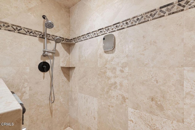 details with a tile shower