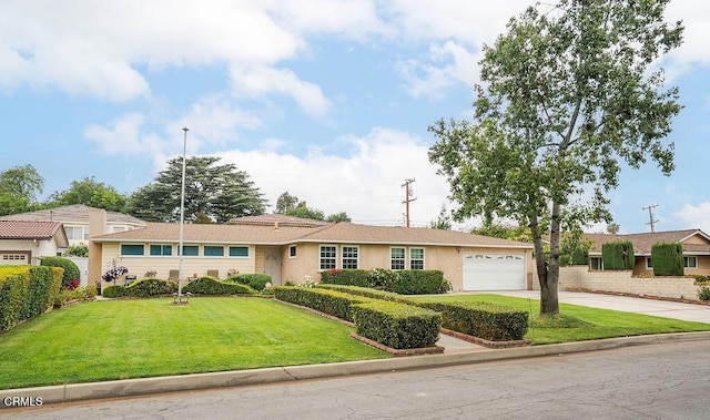 single story home featuring concrete driveway, stucco siding, a front lawn, and a garage