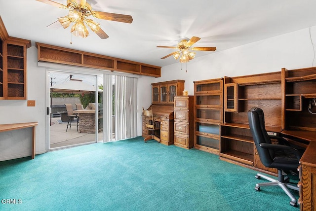 carpeted office space featuring ceiling fan