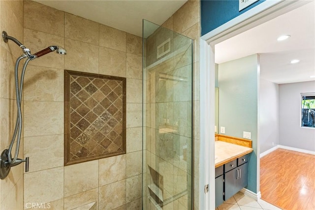 full bath with recessed lighting, visible vents, vanity, baseboards, and a stall shower