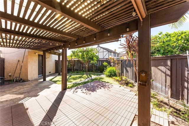 view of patio / terrace featuring a fenced backyard and a pergola