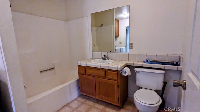 full bath with vanity, tub / shower combination, and toilet