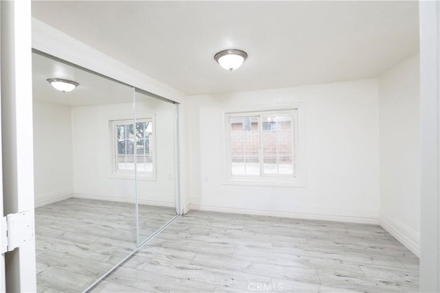 1181 W 4th St, Pomona, CA 91766 - interior space with light wood finished floors, a closet, and multiple windows