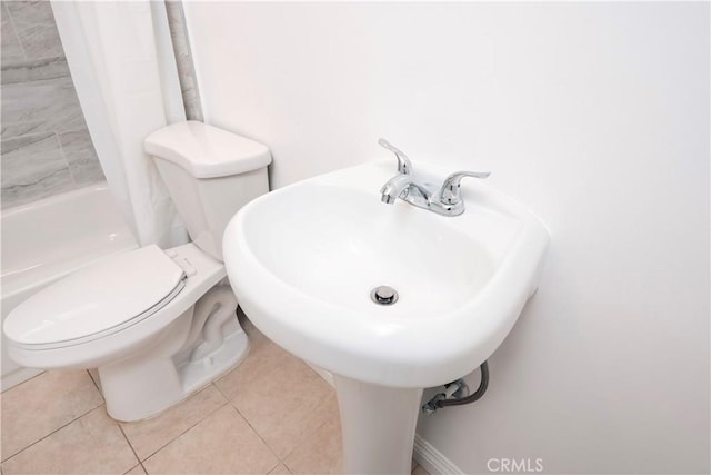 1181 W 4th St, Pomona, CA 91766 - full bathroom featuring shower / tub combo, tile patterned floors, and toilet