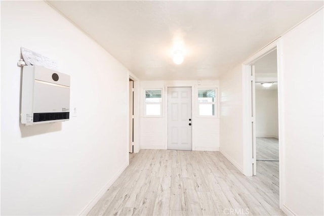 1181 W 4th St, Pomona, CA 91766 - foyer featuring baseboards and wood finished floors