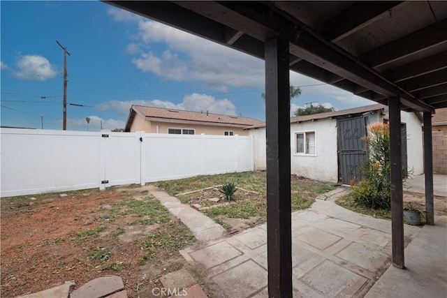 1181 W 4th St, Pomona, CA 91766 - view of yard with a fenced backyard, a gate, and a patio