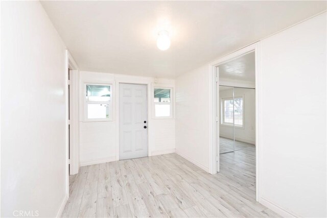 1181 W 4th St, Pomona, CA 91766 - foyer with light wood-style flooring and baseboards