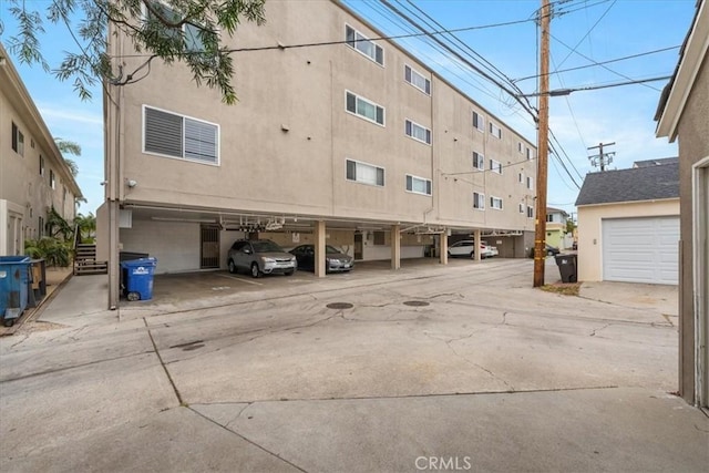 view of property with covered parking