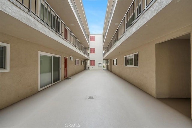 view of property's community featuring a patio