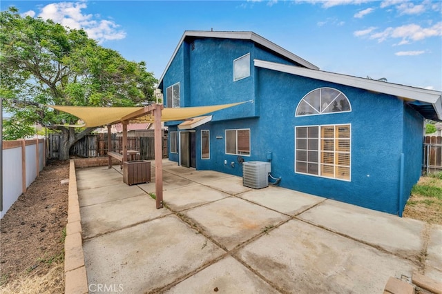2766 Rippling Brook Pl, Ontario, CA 91761 - rear view of property featuring a patio area, stucco siding, a fenced backyard, and central AC unit