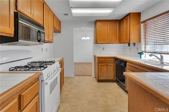 2766 Rippling Brook Pl, Ontario, CA 91761 - kitchen featuring black appliances, tile counters, a sink, light flooring, and a chandelier