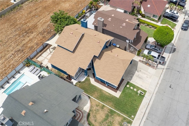 2766 Rippling Brook Pl, Ontario, CA 91761 - aerial perspective of suburban area with a pool