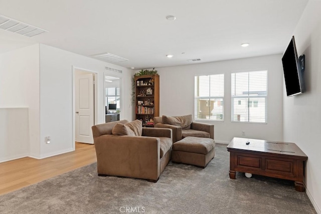5085 Hoss Cir, Hemet, CA 92545 - carpeted living area with wood finished floors and recessed lighting