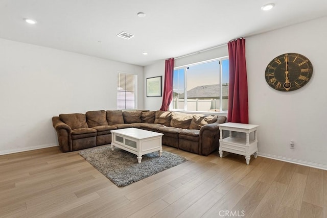 5085 Hoss Cir, Hemet, CA 92545 - living area with light wood-type flooring and recessed lighting
