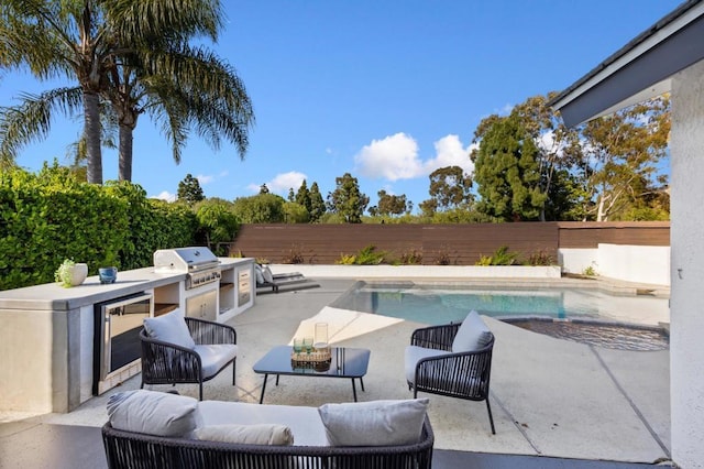 930 N Holly Glen Dr, Long Beach, CA 90815 - view of swimming pool featuring grilling area, a patio area, an outdoor kitchen, and a fenced backyard