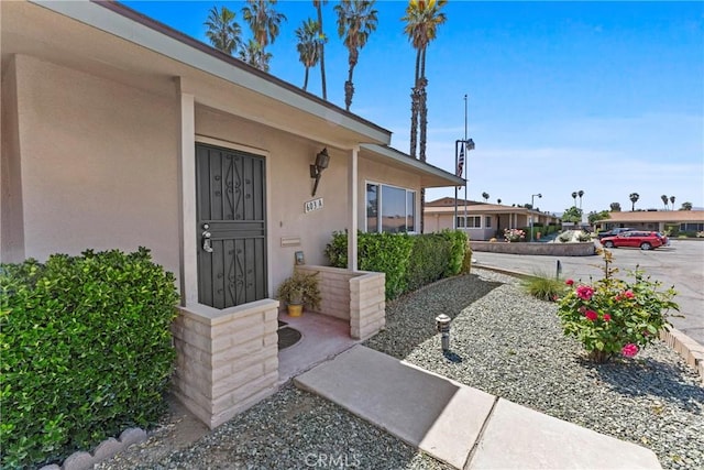 603 S Palm Ave Unit A, Hemet, CA 92543 - doorway to property with stucco siding