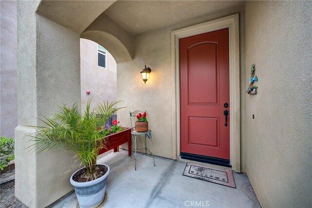 117 Village Cir, Pismo Beach, CA 93449 - view of exterior entry with stucco siding