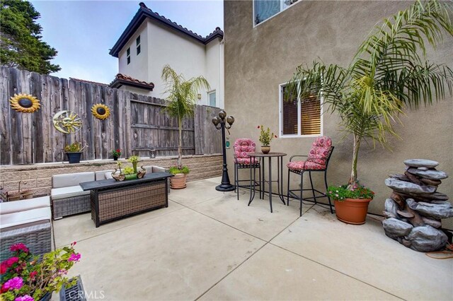 117 Village Cir, Pismo Beach, CA 93449 - view of patio featuring fence and an outdoor hangout area