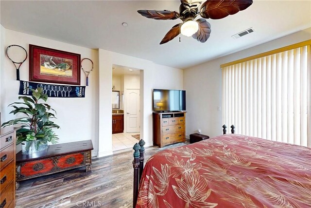 117 Village Cir, Pismo Beach, CA 93449 - bedroom featuring a ceiling fan, visible vents, ensuite bathroom, and light wood-style floors