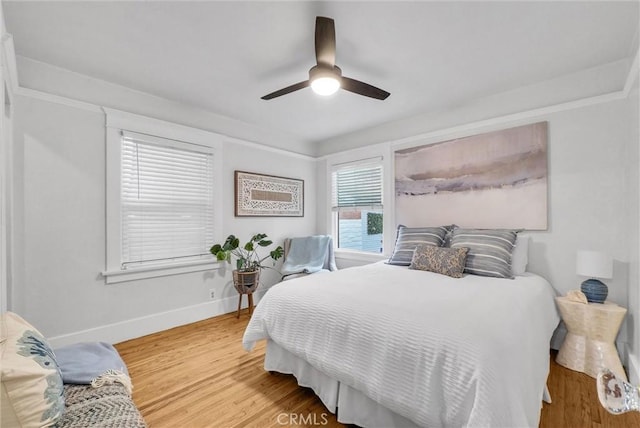 524 Walnut Ave, Long Beach, CA 90802 - bedroom with wood finished floors, baseboards, and a ceiling fan