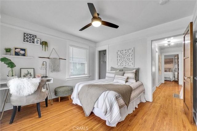 524 Walnut Ave, Long Beach, CA 90802 - bedroom featuring a ceiling fan, baseboards, and light wood-style floors