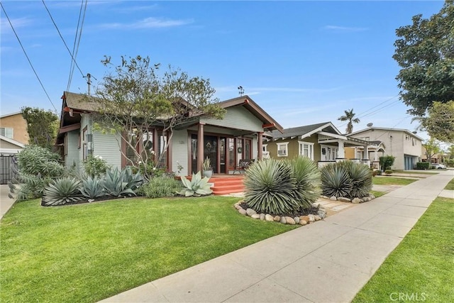 524 Walnut Ave, Long Beach, CA 90802 - view of front of home with a porch and a front lawn