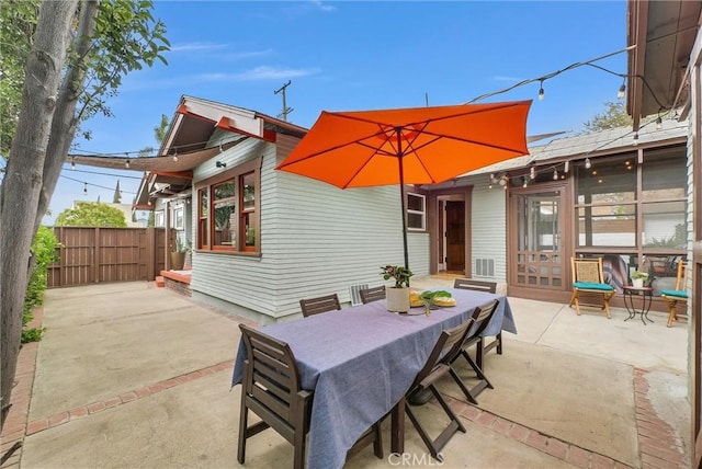 524 Walnut Ave, Long Beach, CA 90802 - view of patio featuring outdoor dining space and fence