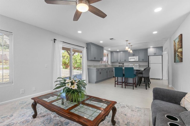 10954 Cool Lake Ter, San Diego, CA 92128 - living room featuring baseboards, a ceiling fan, visible vents, and recessed lighting