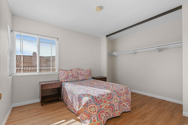 10954 Cool Lake Ter, San Diego, CA 92128 - bedroom with baseboards and wood finished floors