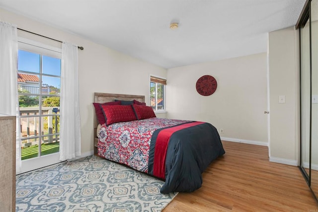 10954 Cool Lake Ter, San Diego, CA 92128 - bedroom featuring wood finished floors and baseboards