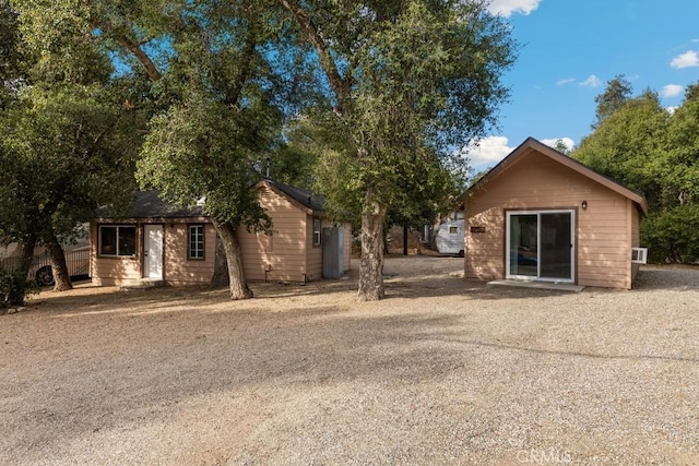 view of front of property with an outdoor structure