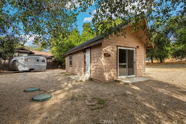 view of outbuilding with an outdoor structure