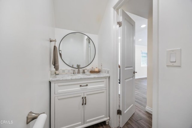 10508 Sunland Blvd Unit 4, Sunland, CA 91040 - bathroom featuring baseboards, wood finished floors, vanity, and recessed lighting