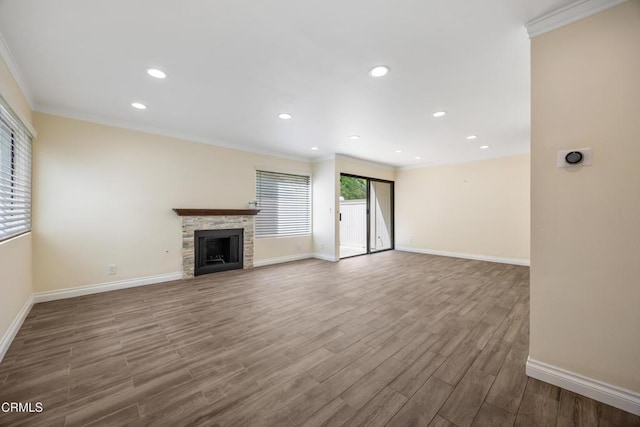 10508 Sunland Blvd Unit 4, Sunland, CA 91040 - unfurnished living room featuring baseboards, ornamental molding, and wood finished floors
