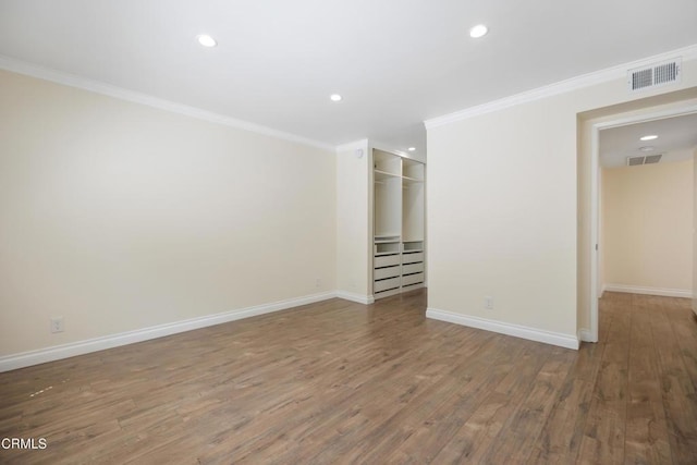 10508 Sunland Blvd Unit 4, Sunland, CA 91040 - unfurnished room featuring wood finished floors, visible vents, and ornamental molding
