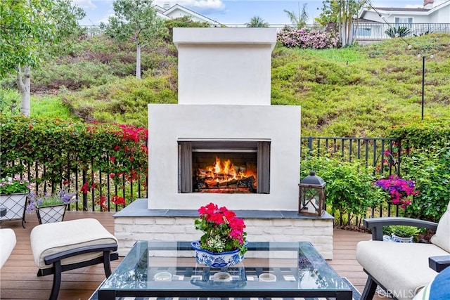 balcony with a warm lit fireplace