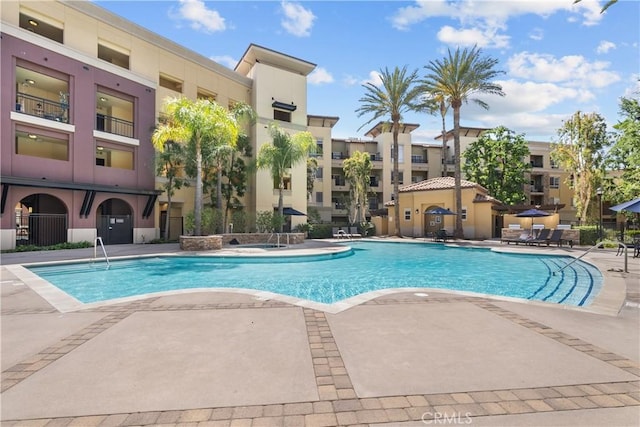 24535 Town Center Dr Unit 6309, Valencia, CA 91355 - community pool featuring a patio area