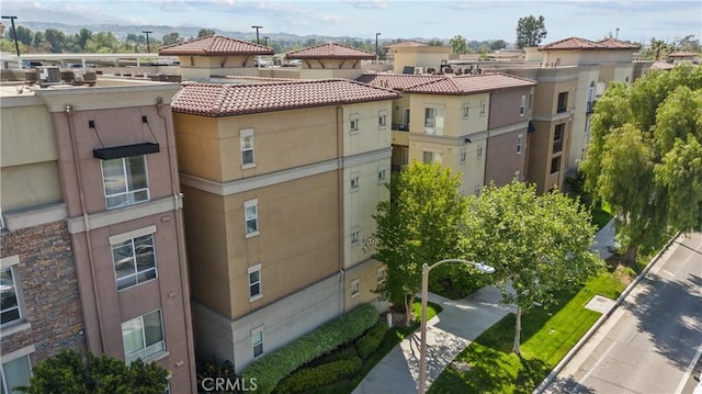 24535 Town Center Dr Unit 6309, Valencia, CA 91355 - view of building exterior with a residential view