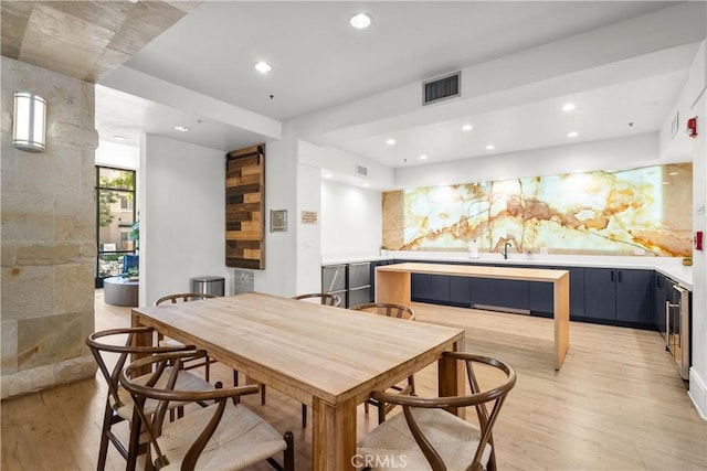 24535 Town Center Dr Unit 6309, Valencia, CA 91355 - dining space with light wood-style flooring and recessed lighting