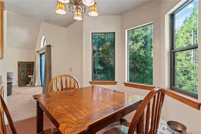 29278 Pine Dr, Cedar Glen, CA 92321 - dining area featuring a chandelier and carpet floors